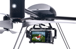 Illustration for article titled Draganfly X6 UAV: UFO Thingy Packed With Carbon Fiber, HD/Night Cameras and GPS